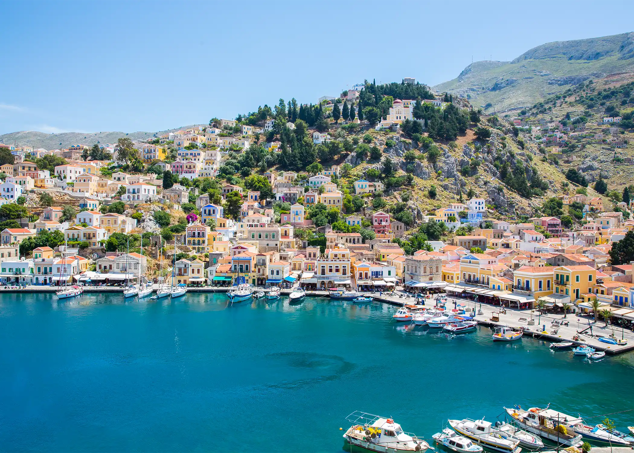 Symi is home to one of the most beautiful harbours in Greece, backed by a rise of neoclassical homes painted in warm pastels. It’s a favourite hideaway among the yachting community, with its charming seaside tavernas and tranquil beaches. But if you’re up for an adventure, you’ll find more than 100 monasteries tucked away among the island’s pine forests and cypress groves.